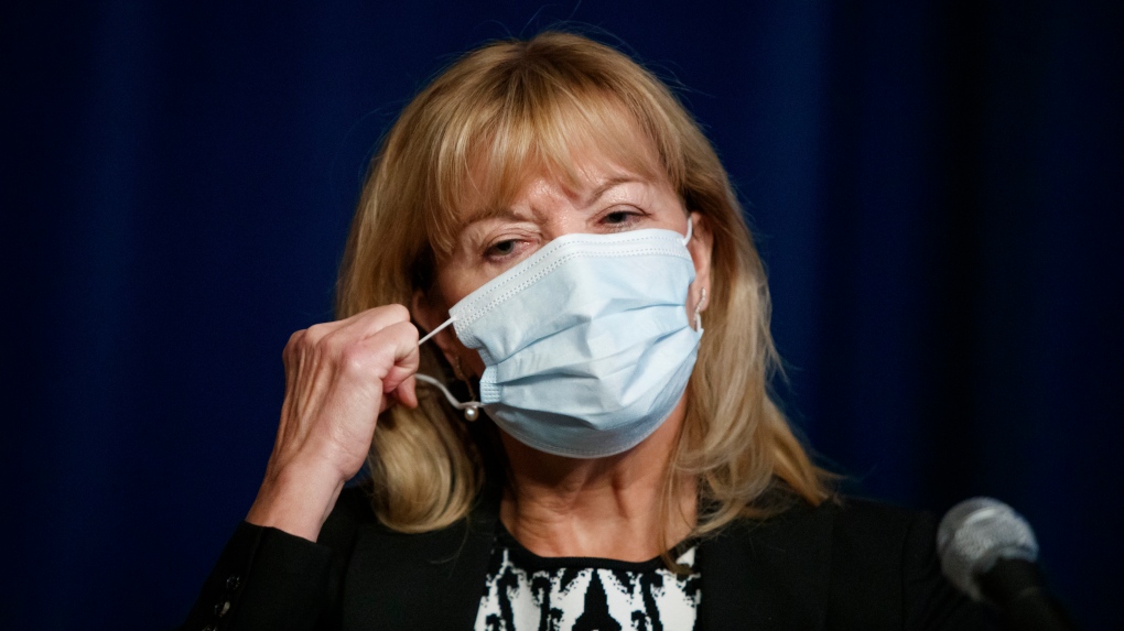Ontario Minister of Health Christine Elliott removes her mask to speak at a press conference at Queen's Park in Toronto, Wednesday, Sept. 22, 2021. THE CANADIAN PRESS/Cole Burston 