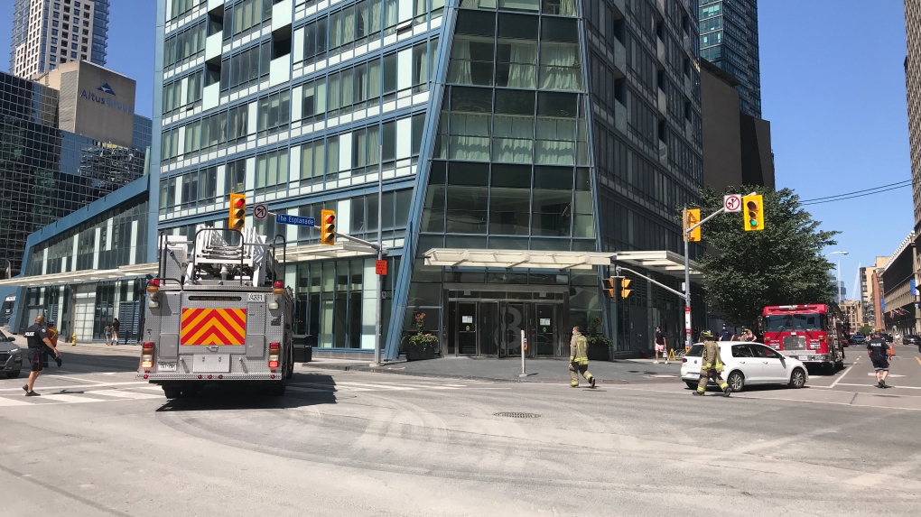 Toronto Fire responded to a downtown building after a service crane collapsed. (CTV News/Craig Wadman)