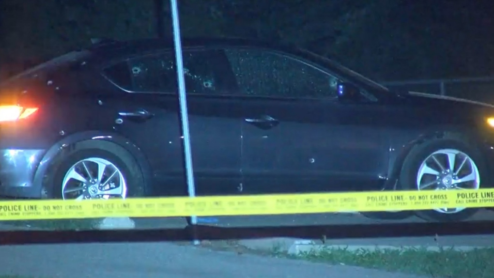 An Acura sedan with multiple bullet holes in it is seen on Aug. 16, 2021. (Peter Mills)