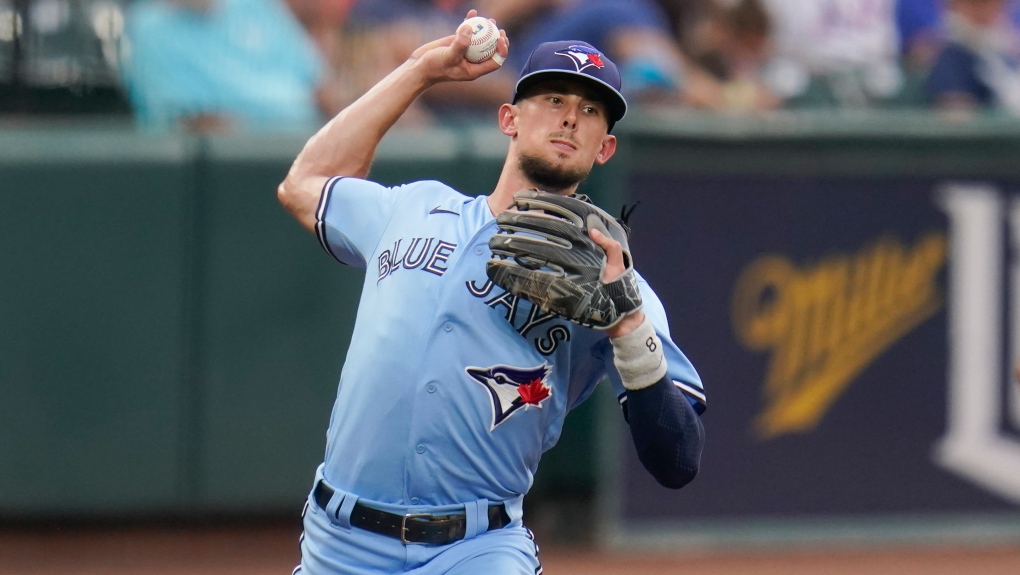 Cavan Biggio of the Toronto Blue Jays looks on from first base