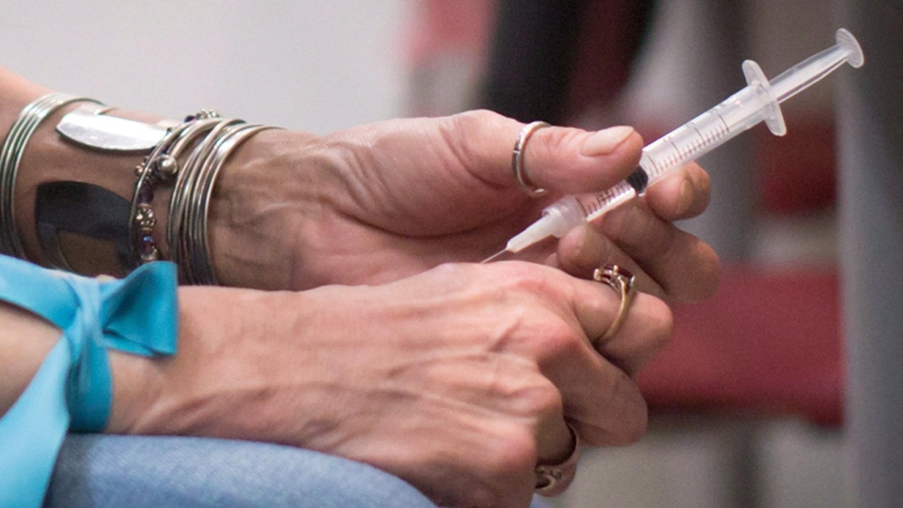 A person injects hydromorphone at the Providence Health Care Crosstown Clinic in the Downtown Eastside of Vancouver, B.C., on Wednesday April 6, 2016.&nbsp;Ontario's doctors have reached a deal with the province over how much addictions doctors will be paid for virtual care after the physicians raised an outcry over previously planned changes would have put 30,000 patients at risk of losing lifesaving opioid treatments, The Canadian Press has learned.&nbsp;&nbsp;THE CANADIAN PRESS/Darryl Dyck