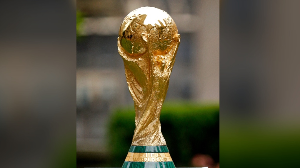 FILE - The FIFA World Cup soccer trophy is displayed Thursday, June 16, 2022, in New York. (AP Photo/Noah K. Murray, File)