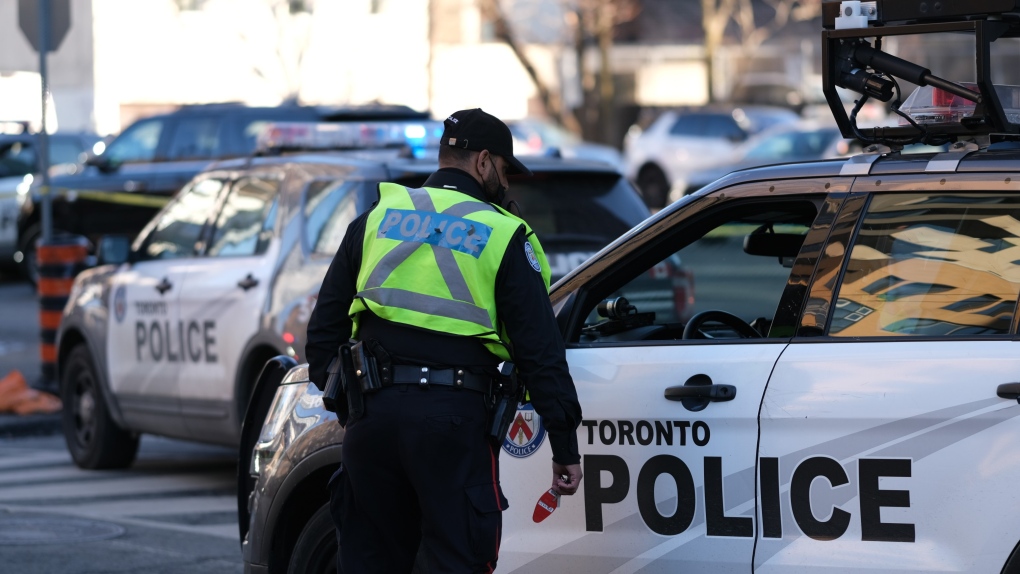 A Toronto police officer is seen downtown on Sunday, March 6, 2022. (Simon Sheehan/CP24)
