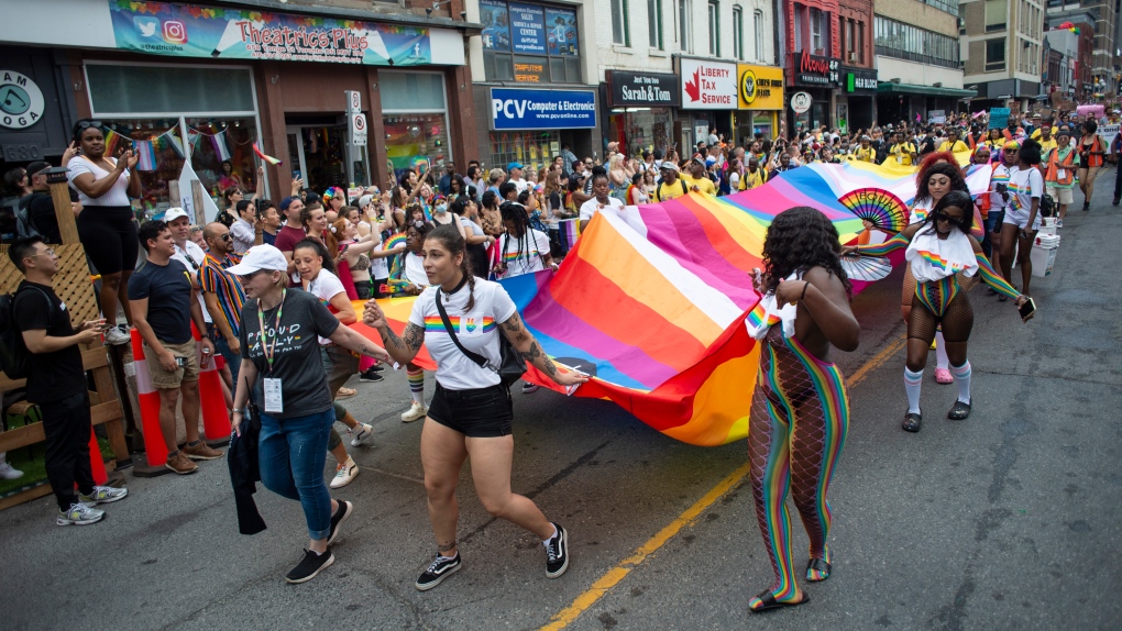 Just chilling with good friends and the Toronto blue jays on Pride day -  Toronto Guardian