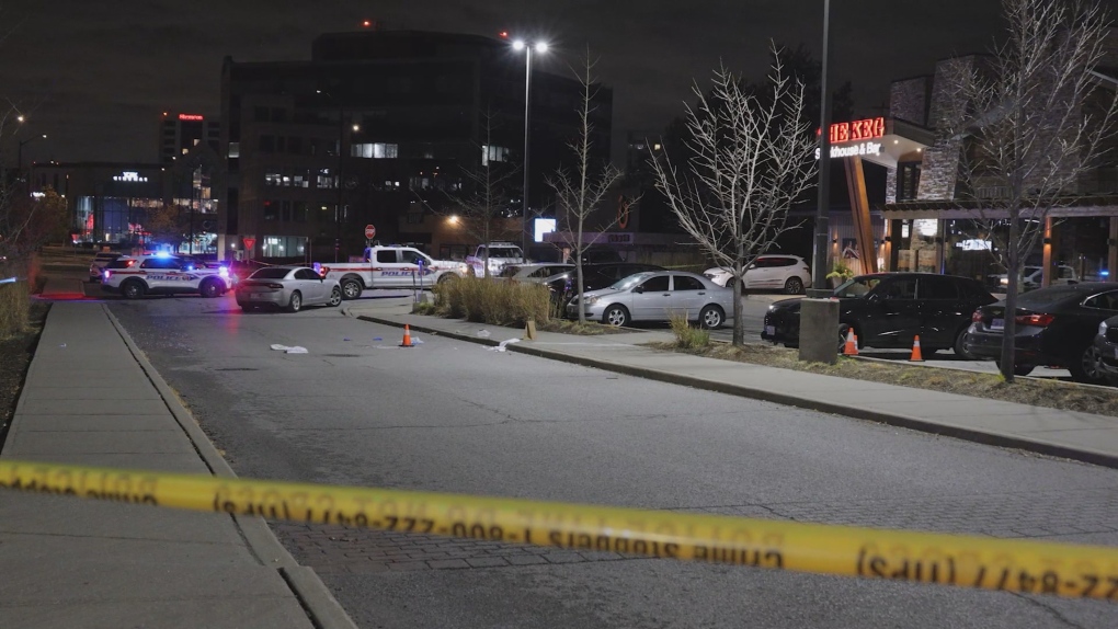 Police respond to the scene of a shooting at a plaza in Richmond Hill Friday, November 17, 2023. 