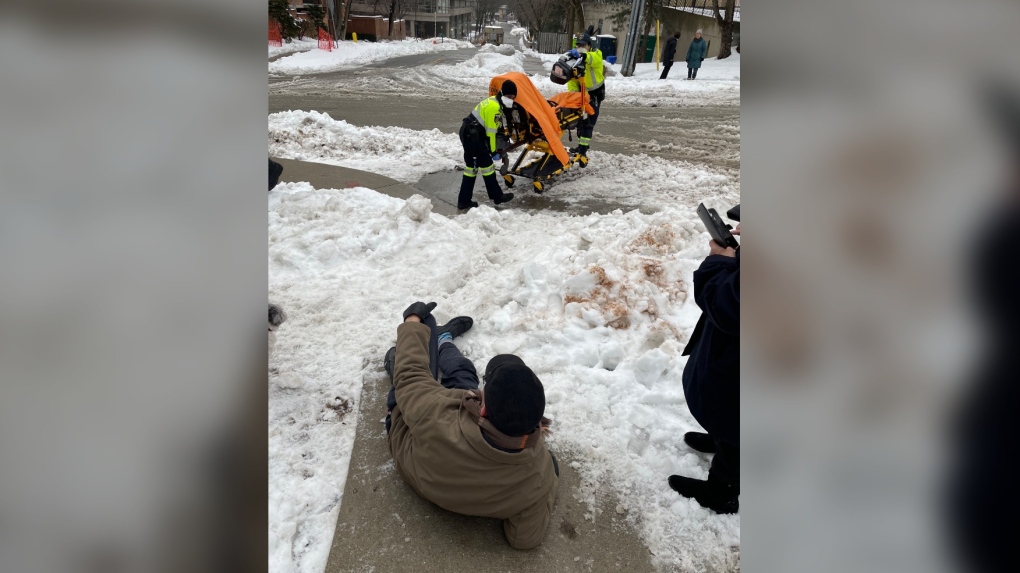 Toronto paramedics encountered snow and ice on a sidewalk as they attempted to bring a stretcher to assist patient Alvin Rebick on March 5. (Kael Rebick photo)