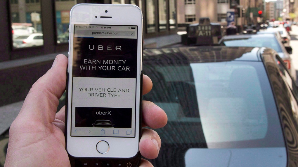 The ride-hailing app Uber is shown on a smartphone, May 14, 2015. (Ryan Remiorz / THE CANADIAN PRESS)