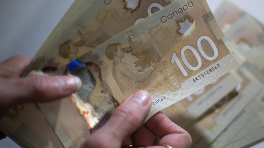 Average Canadian families start working for themselves Friday, June 9, Tax Freedom Day, according to the Fraser Institute. (File photo/THE CANADIAN PRESS)