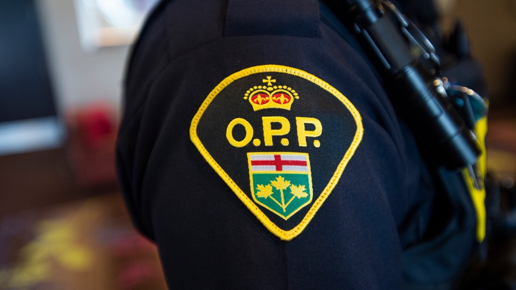 An Ontario Provincial Police crest is displayed on the arm of an officer during a press conference in Vaughan, Ont., on Thursday, June 20, 2019. THE CANADIAN PRESS/Andrew Lahodynskyj