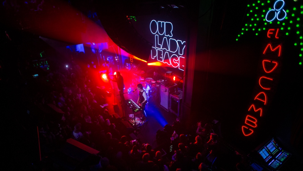 Our Lady Peace play to a packed crowd as they mark the re-opening of the iconic Toronto music venue The El Mocambo on Saturday, October 30, 2021. THE CANADIAN PRESS/Chris Young 
