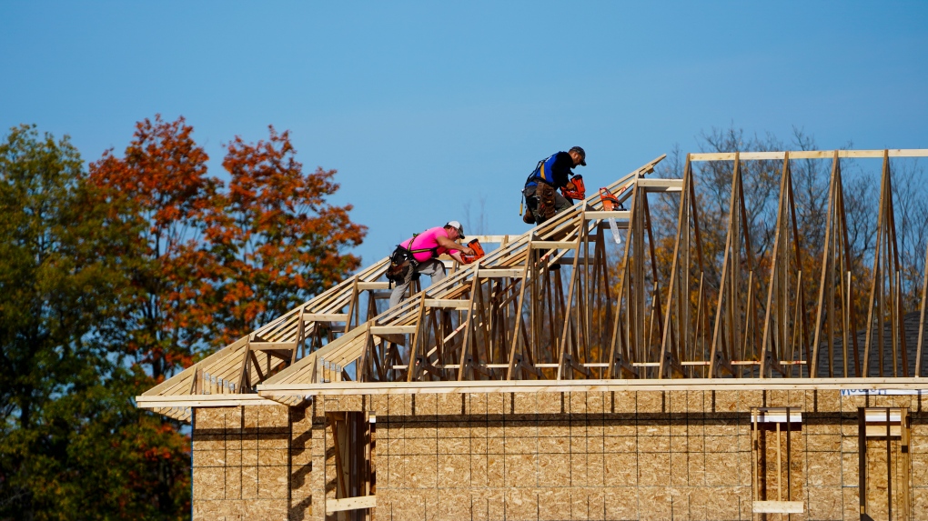 FILE - Carpenters work on new home in a newly constructed subdivision in Ottawa on Wednesday, Oct. 20, 2021. (THE CANADIAN PRESS / Sean Kilpatrick)