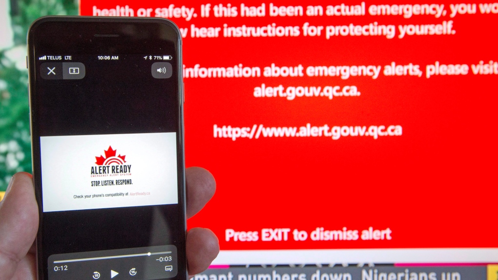 A smartphone and a television receive visual and audio alerts to test Alert Ready, a national public alert system Monday, May 7, 2018 in Montreal.THE CANADIAN PRESS/Ryan Remiorz