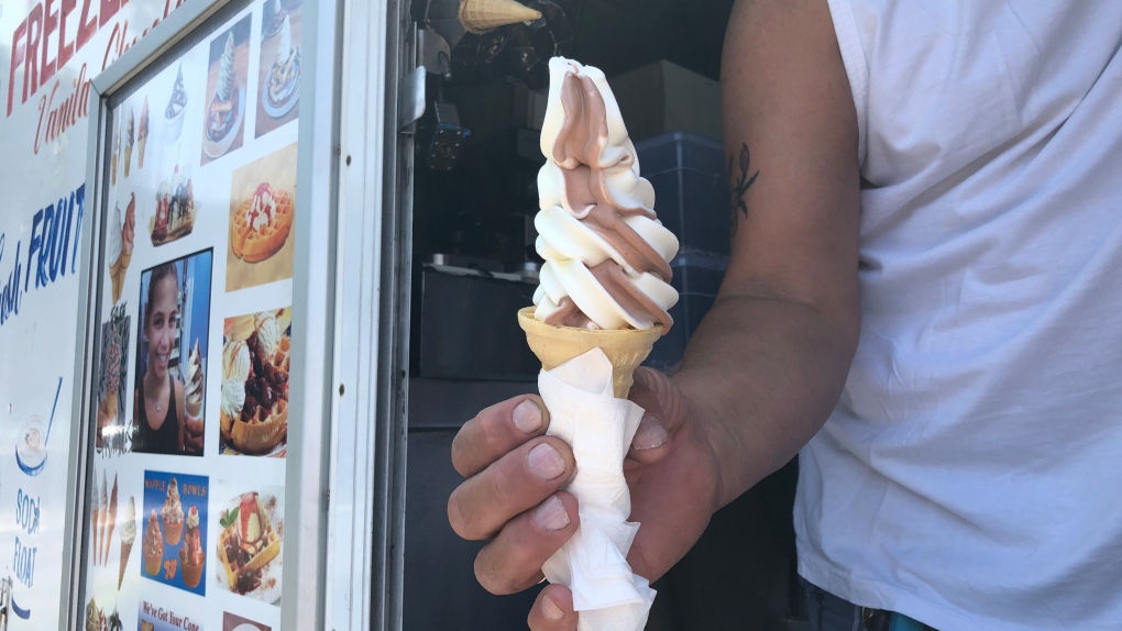Michael Mavrogiannis serves ice cream from his truck in Toronto (CTV News Toronto/ Hannah Alberga). 