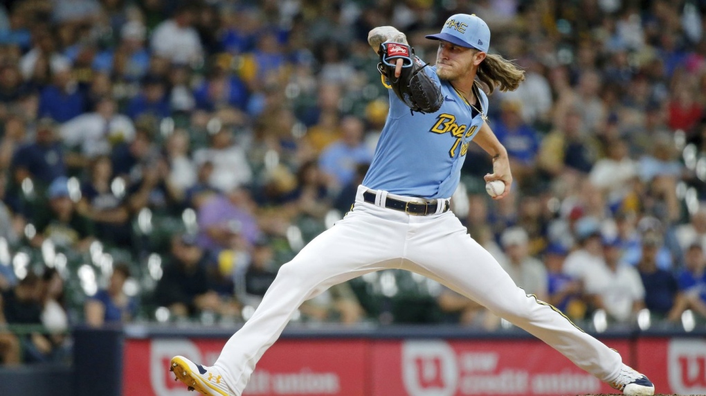 Milwaukee Brewers relief pitcher Josh Hader throws against the Toronto Blue Jays during the ninth inning of a baseball game Saturday, June 25, 2022, in Milwaukee. (AP Photo/Jon Durr)