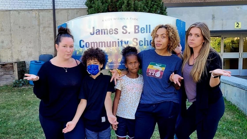 From left, Jessica Robinson and her son Austin with fellow PLASP program participant Janae and her mom Keshia Ashby and parent Eleanor MacDowell outside James S. Bell Community School.