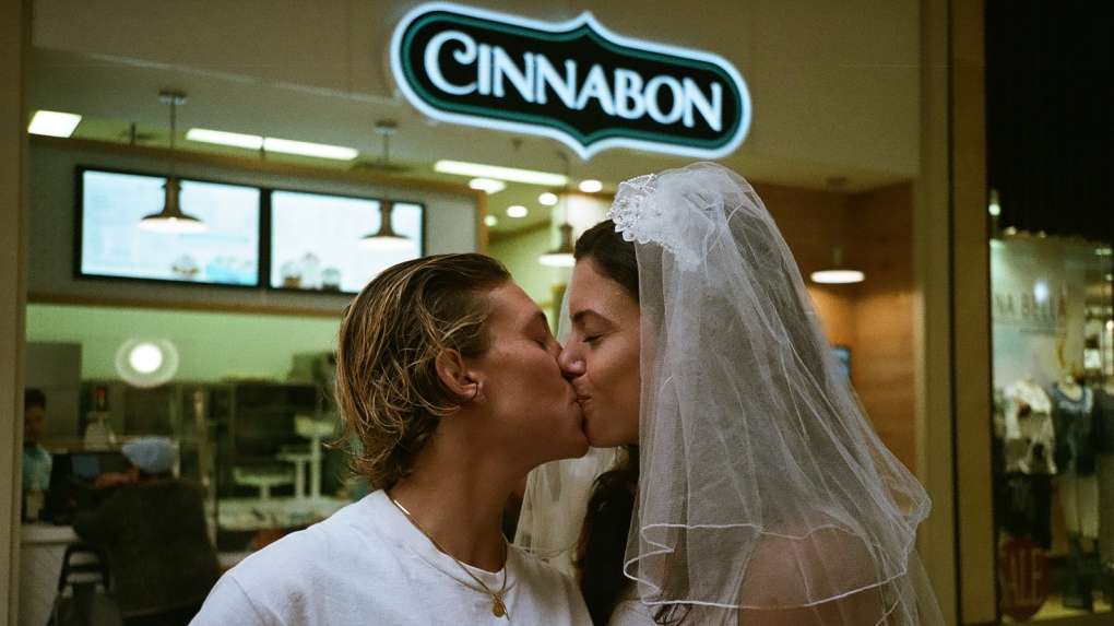 Andi Larocca and Kate Palumbo kissed in front of the Cinnabon in Dufferin Mall on September 6, 2022 (Supplied). 
