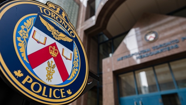 The Toronto Police Service's emblem is photographed during a press conference at TPS headquarters, in Toronto on Tuesday, May 17, 2022. (THE CANADIAN PRESS/Christopher Katsarov)