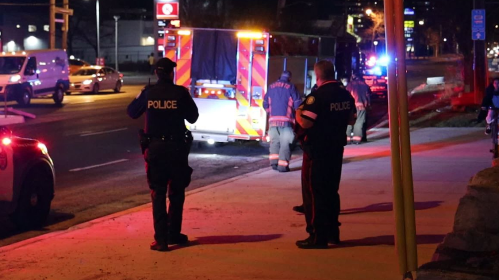 Toronto police investigate at the scene of a stabbing in northwest Toronto Friday evening. 