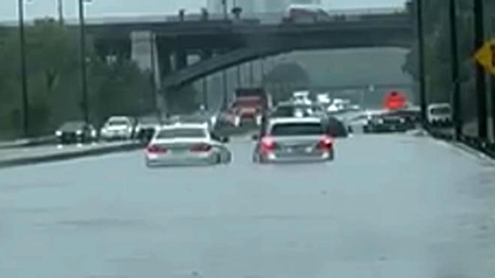 WATCH: Cars get stuck on flooded DVP