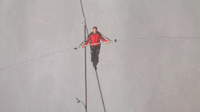 Daredevil Nik Wallenda crosses Niagara Falls on a tightrope on Friday, June 15, 2012.